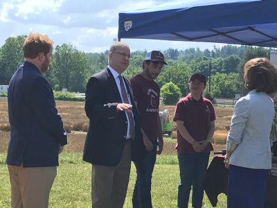 Dean Grant speaking to First Lady Pamela Northam