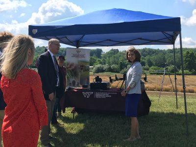 Dean Grant speaking to First Lady Pamela Northam