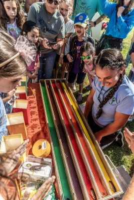 Cheering on the roaches in our wacky and wild Cockroach Races!