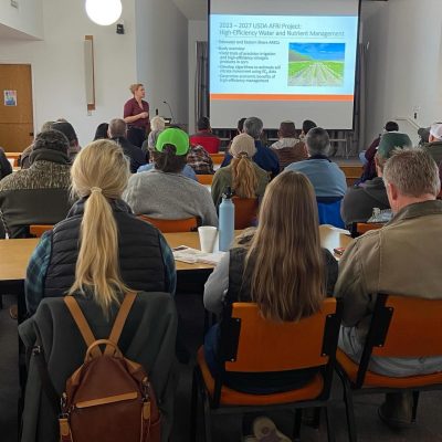 Seated attendees listen as Dr. Julie Shortridge discusses irrigation at the Tidewater AREC Soil Fertility Workshop