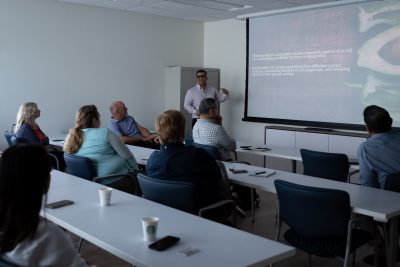 Researcher presenting information about nanobubbles in the Virginia AREC classroom.