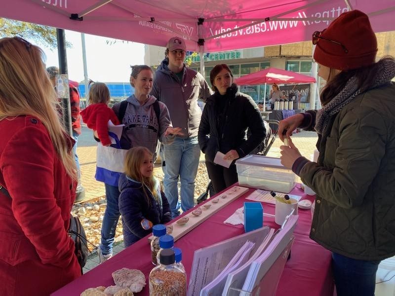 Communications Associate Keri Rouse and fellow staff and faculty taught event participants about oyster seed and the center's work supporting oyster hatcheries. 