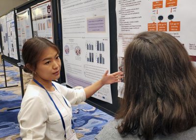 Researchers attend and present at conference.