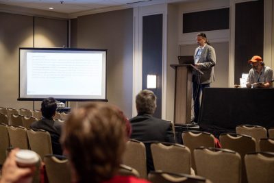 Researchers attend and present at conference.