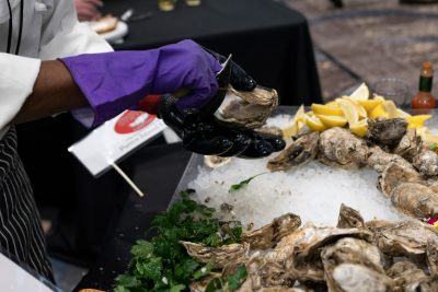 Virginia oysters being shucked and served